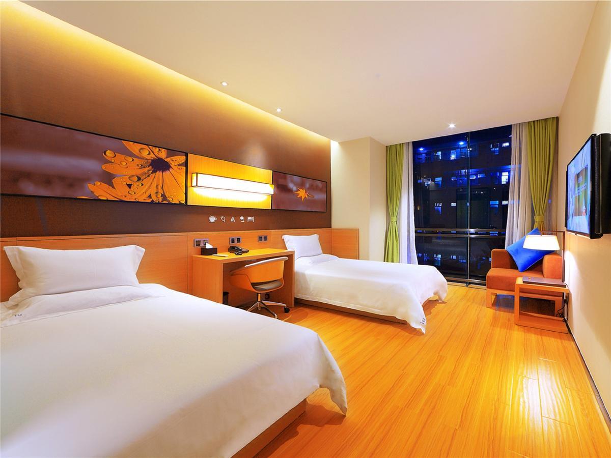 Iu Hotel Zhanjiang Haibin Avenue Xinhaimingchen Extérieur photo